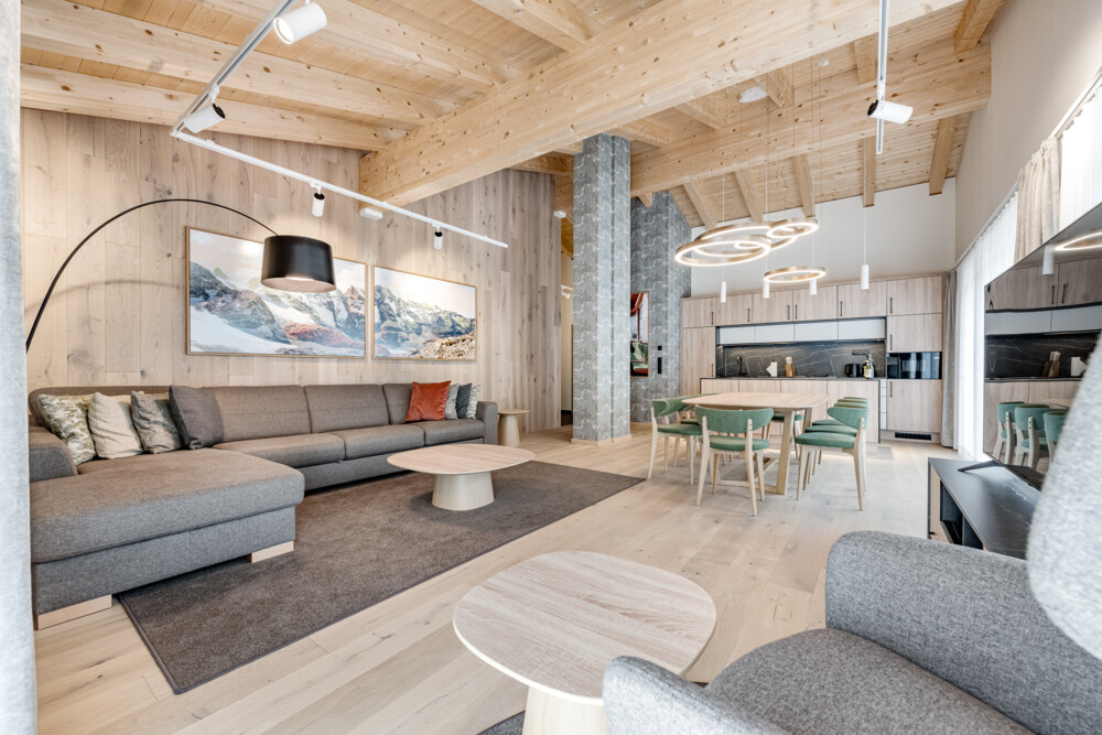 Living room of Penthouse 2000 at Chalet Obergurgl with open timber roof
